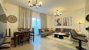 Al Reef Retreat Your 1BR with Sofa Beds Pool and Gym